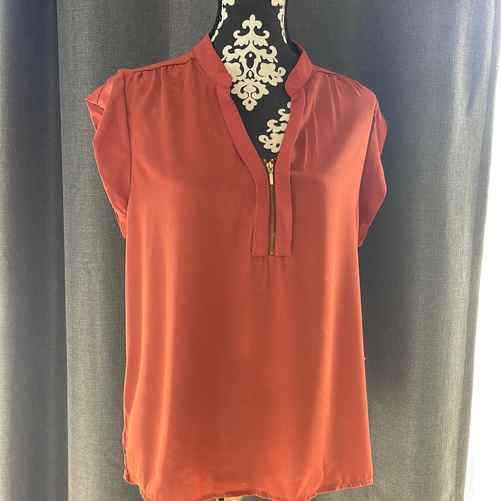Rust/Brick color cap sleeve blouse